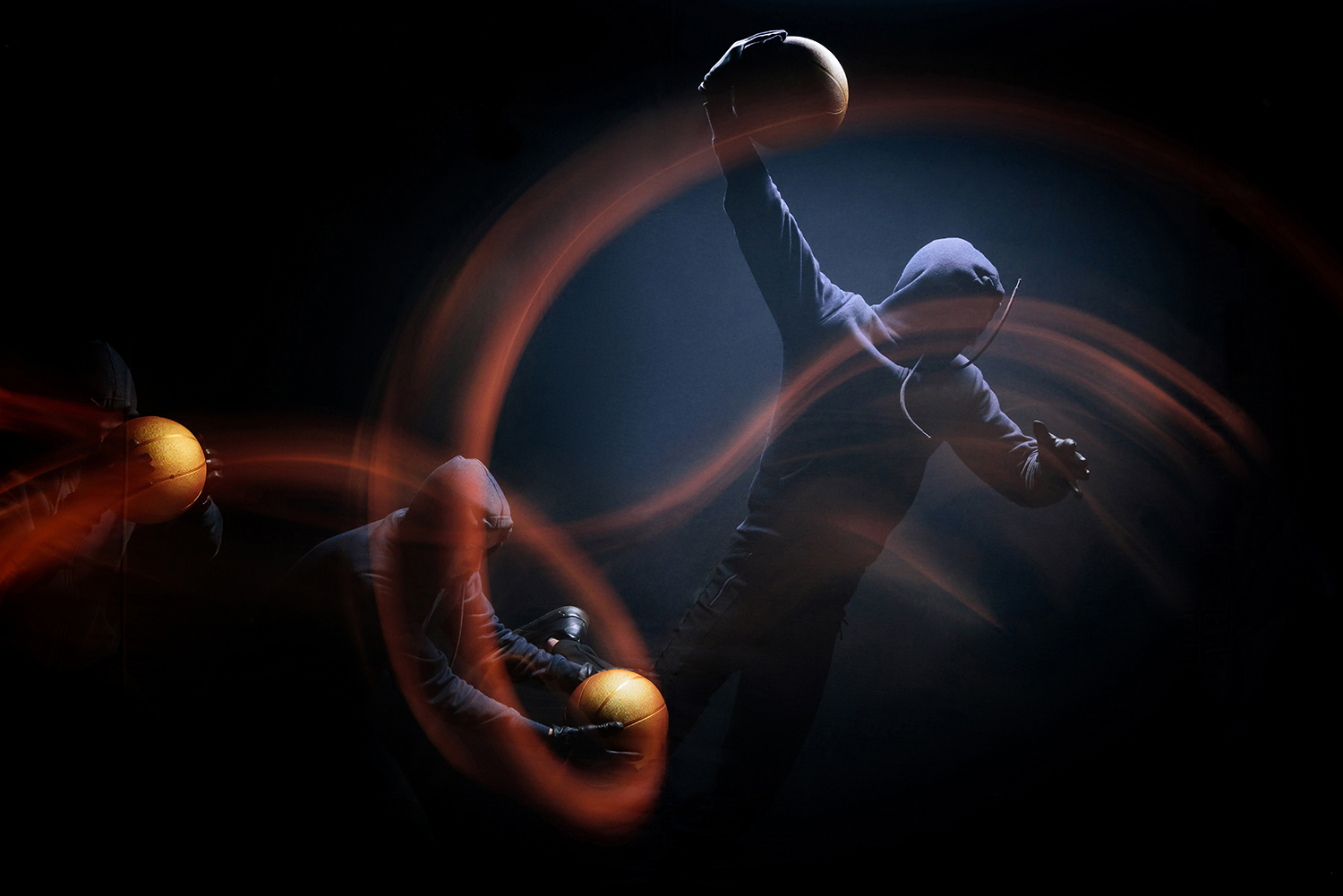 Basketball player with motion light trails